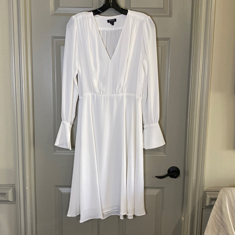 Worth dress with matching belt accessory. Never worn